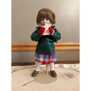 Norman Rockwell's "Little Girl and Her Doll" porcelain doll the Danbury Mint.